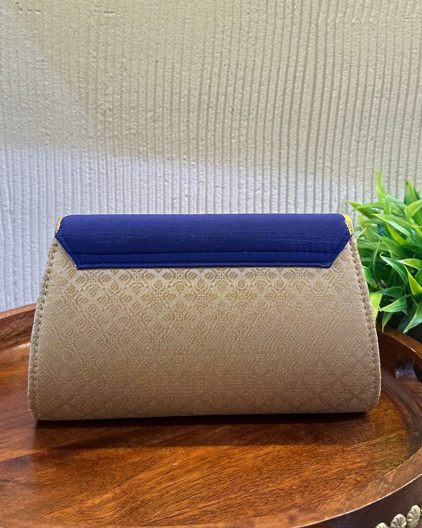 The Tanjore Art clutch-royal blue