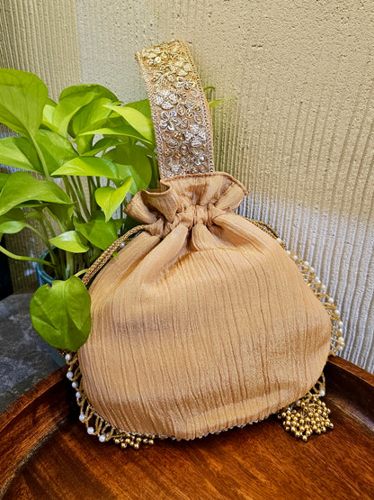 All Gold handle Potli