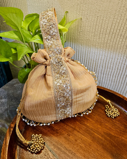 All Gold handle Potli