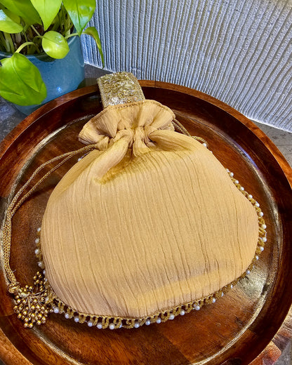 All Gold handle Potli