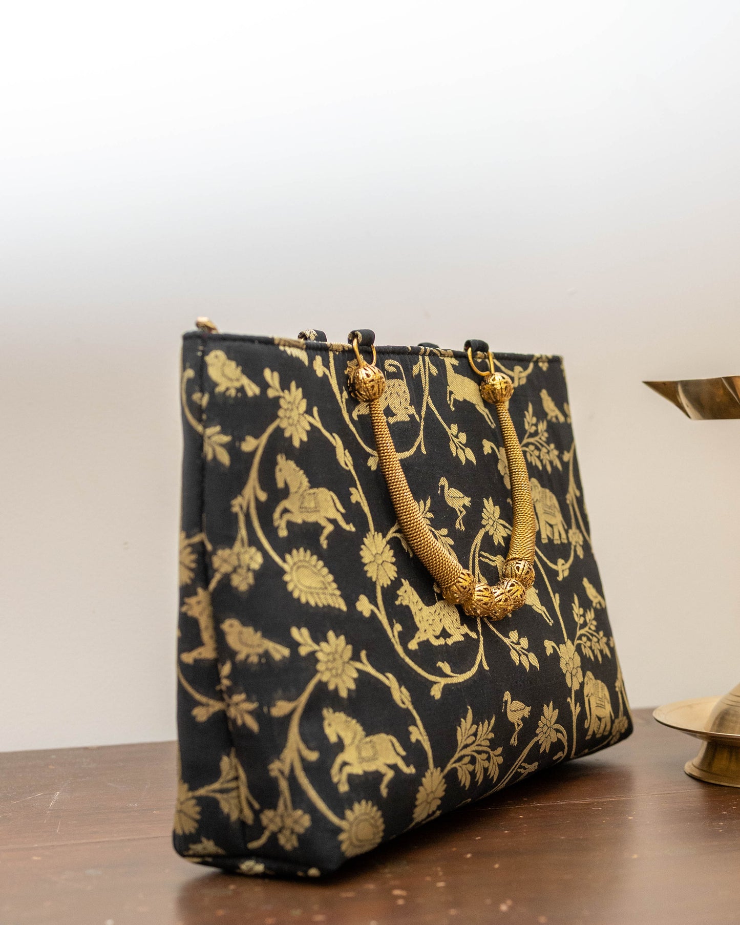 Black Animal themed Gold Handle Bag