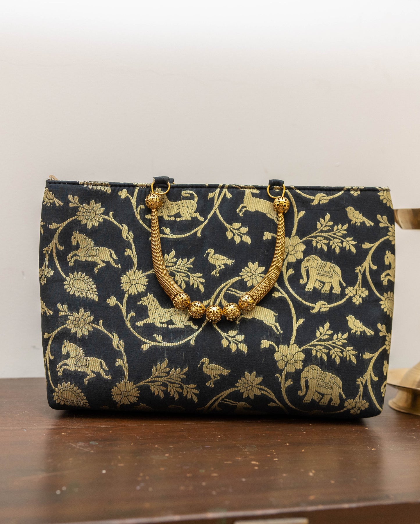 Black Animal themed Gold Handle Bag
