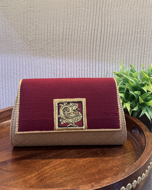 The tanjore art clutch-maroon